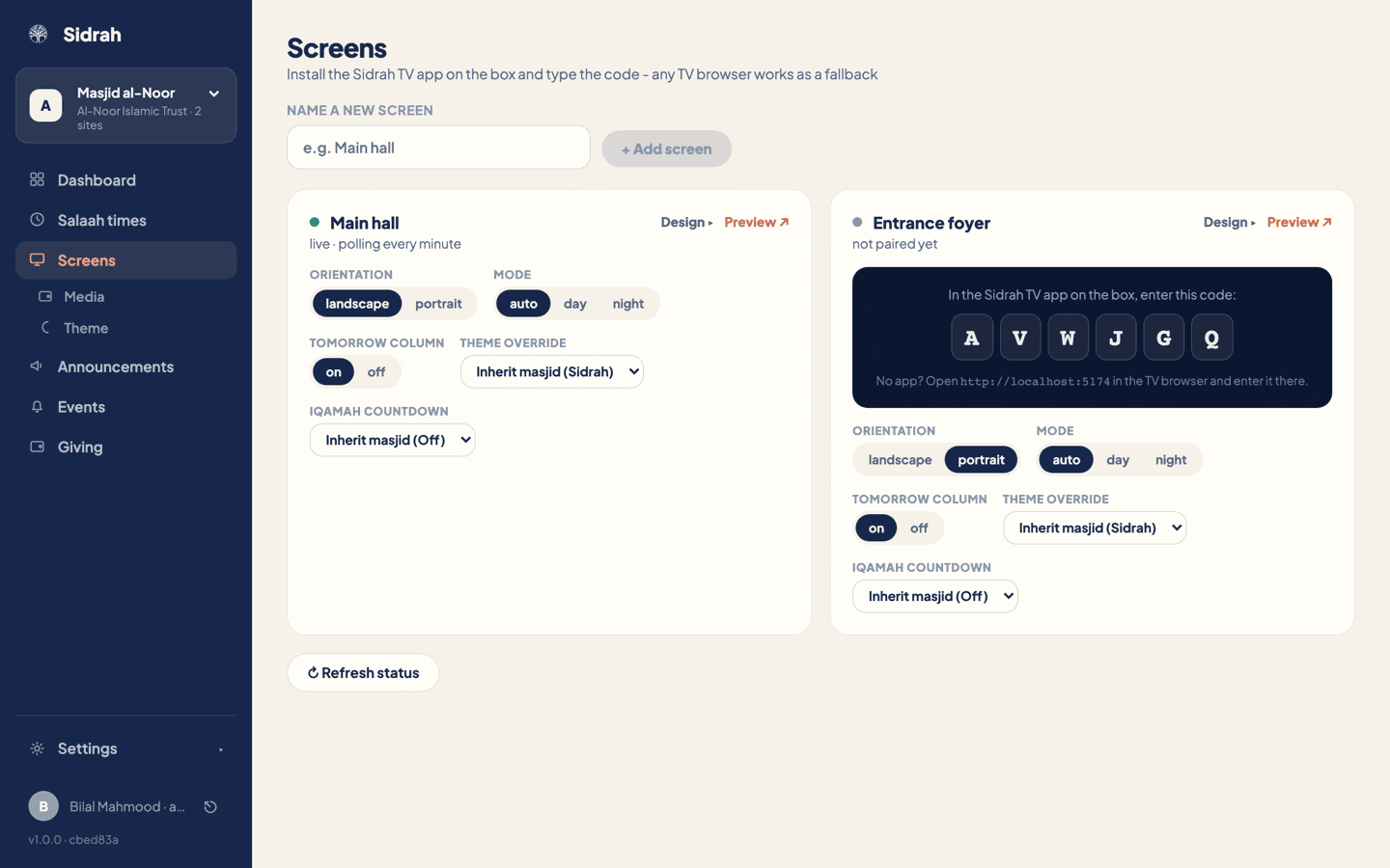 The Screens page with two cards: Main hall showing a green dot and live, and Entrance foyer showing not paired yet with the pairing code A V W J G Q